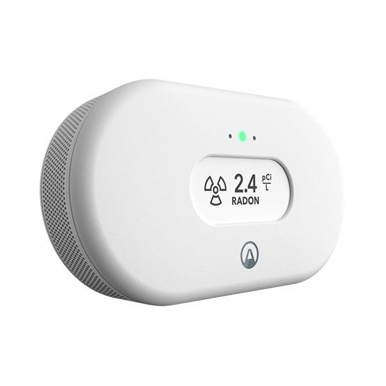 The Airthings View radon monitor, a white oval unit with a small display.