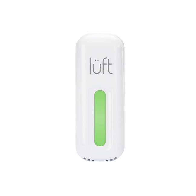 The SunRADON lüft radon monitor, a small white unit with a green light bar.