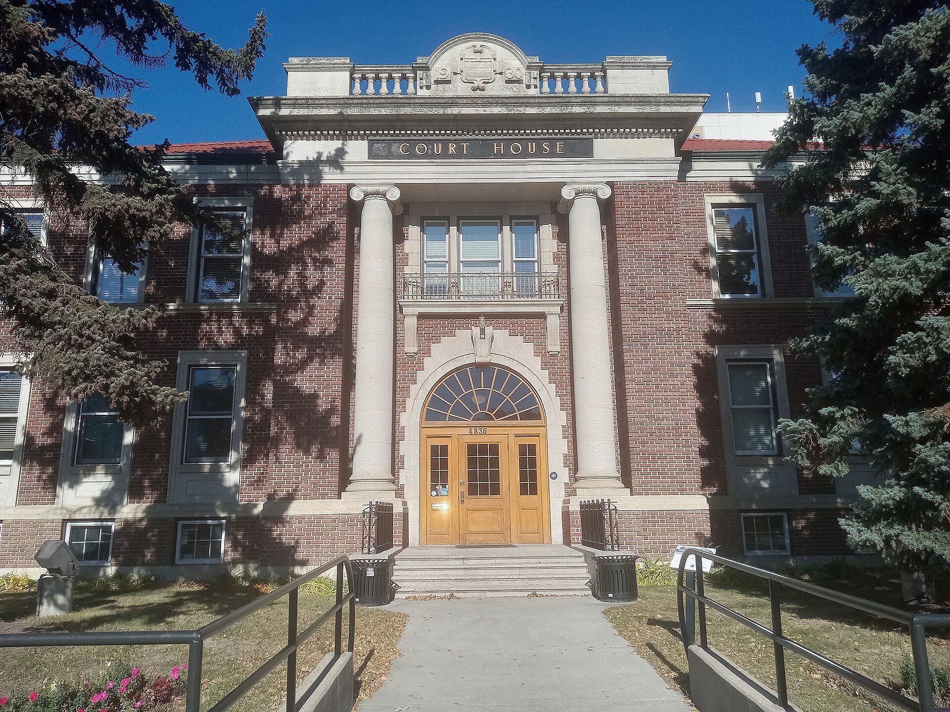 The old court house, a brick building with columns, in Red Deer, Alberta.
