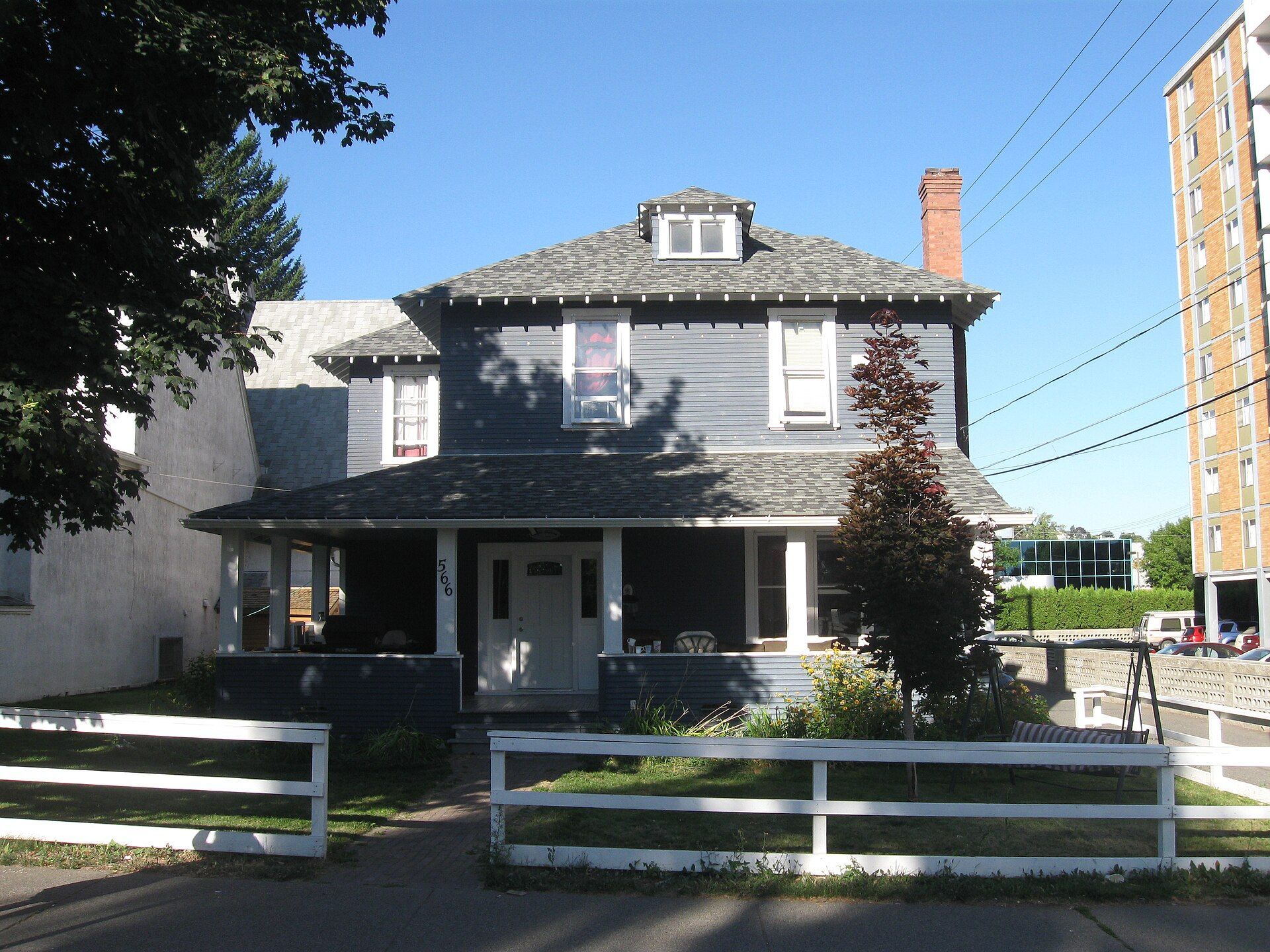 A square two-storey house from 1911 in Kamloops, British Columbia.