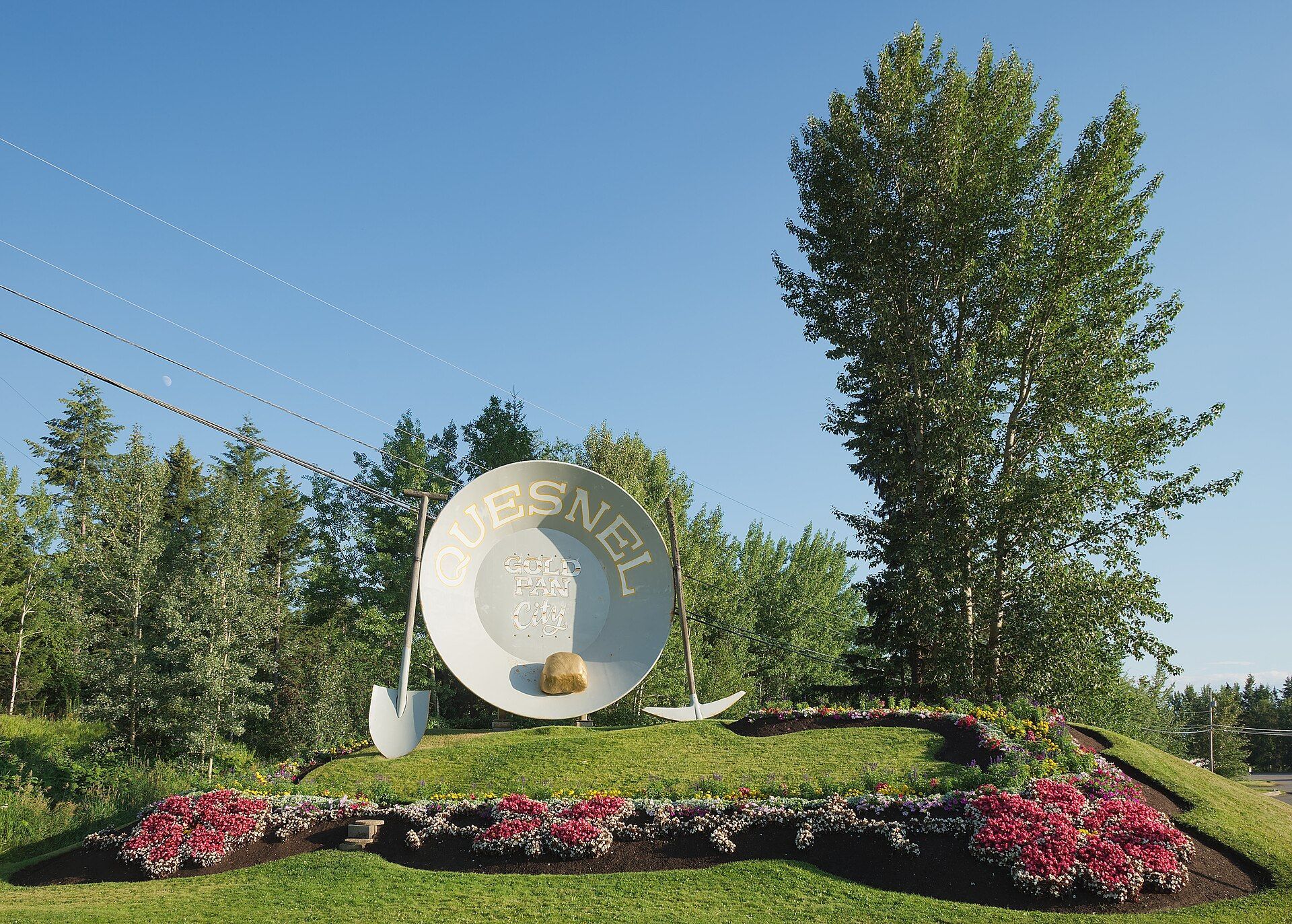 The giant gold pan landmark in a garden in Quesnel, British Columbia.