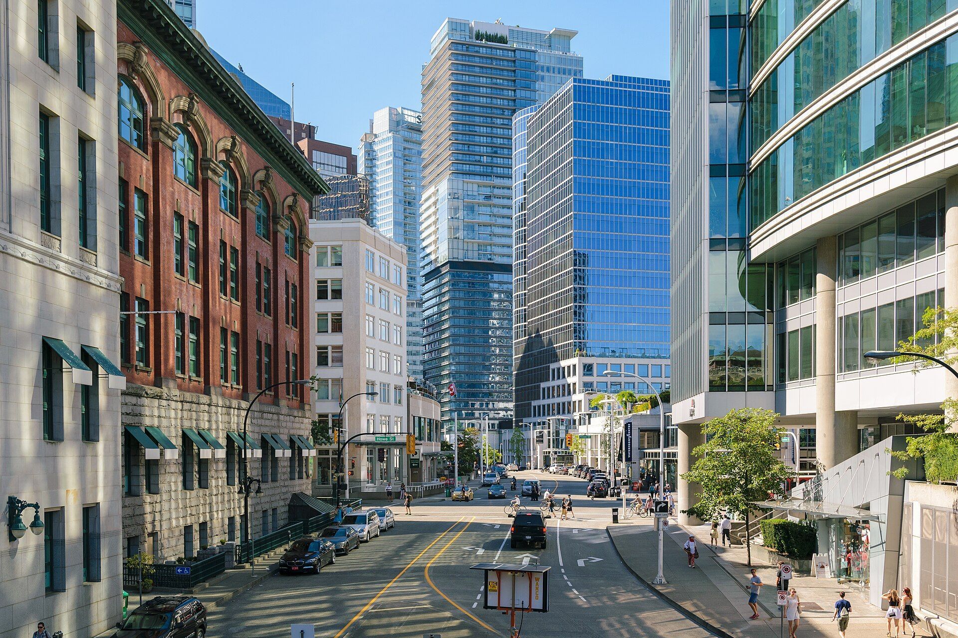 West Cordova Street in Vancouver, with older brick buildings and newer towers.