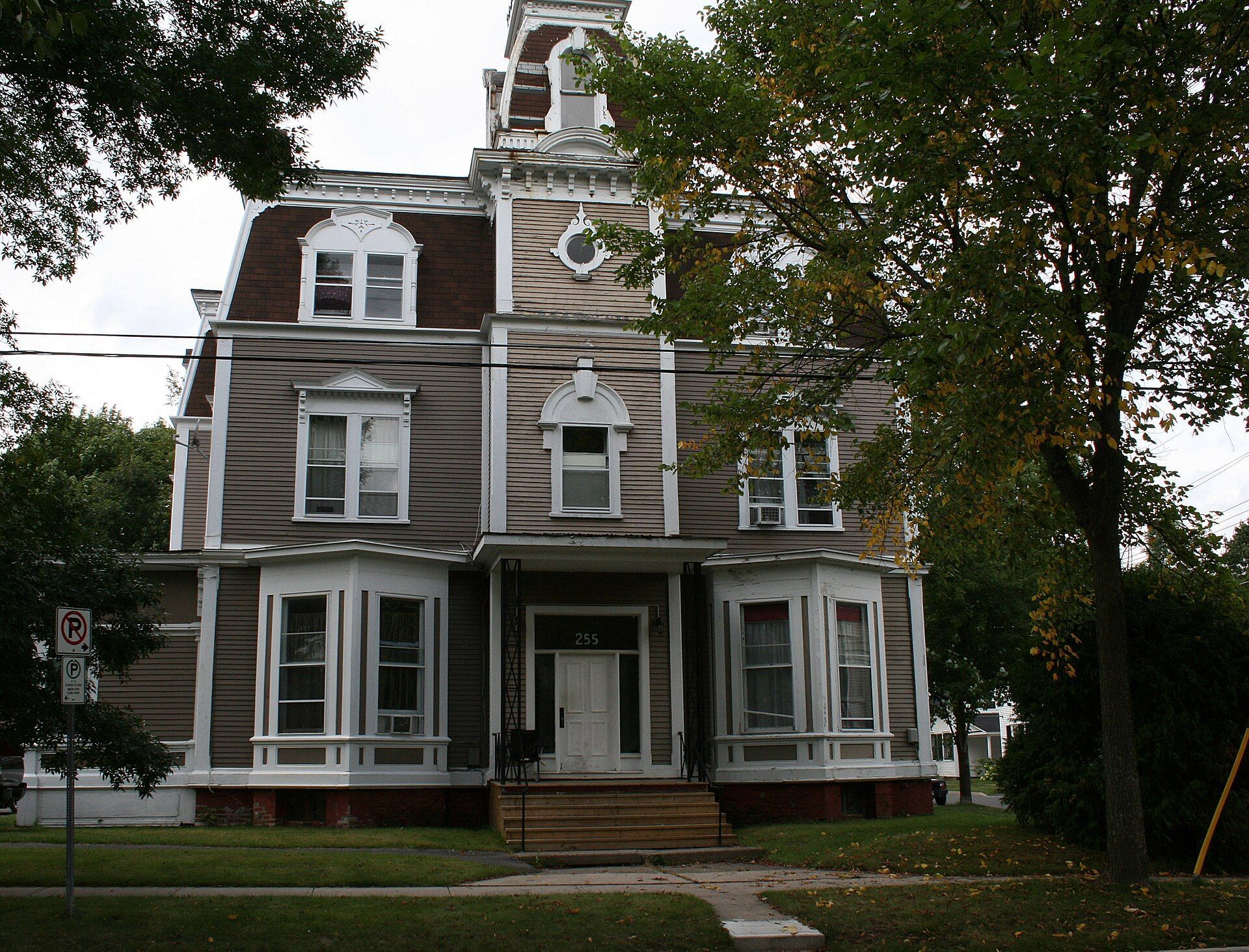Neill House, a tall house with a mansard roof, in Fredericton, New Brunswick.