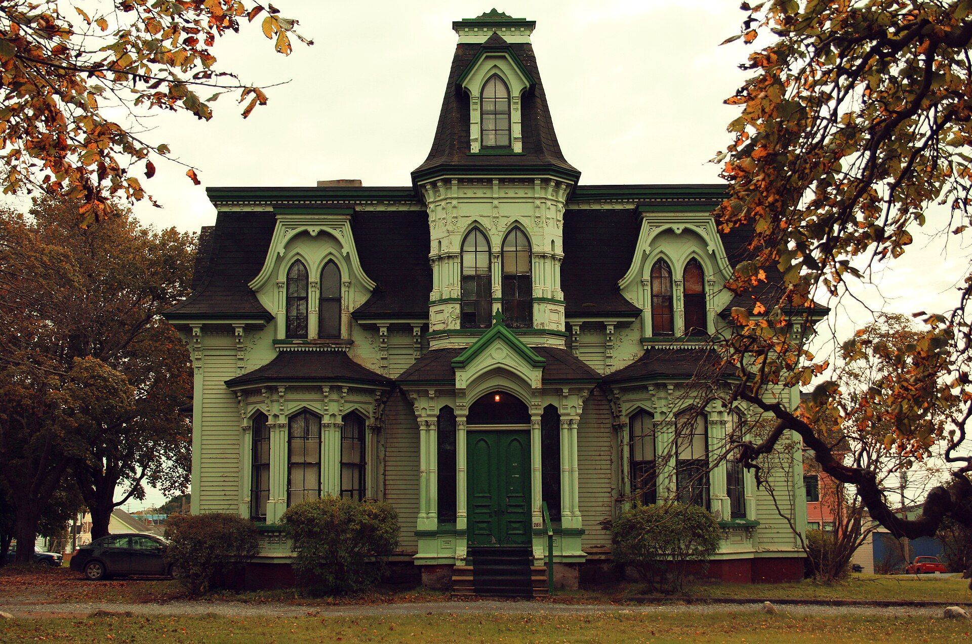 A green Victorian house on Lancaster Avenue in Saint John, New Brunswick.