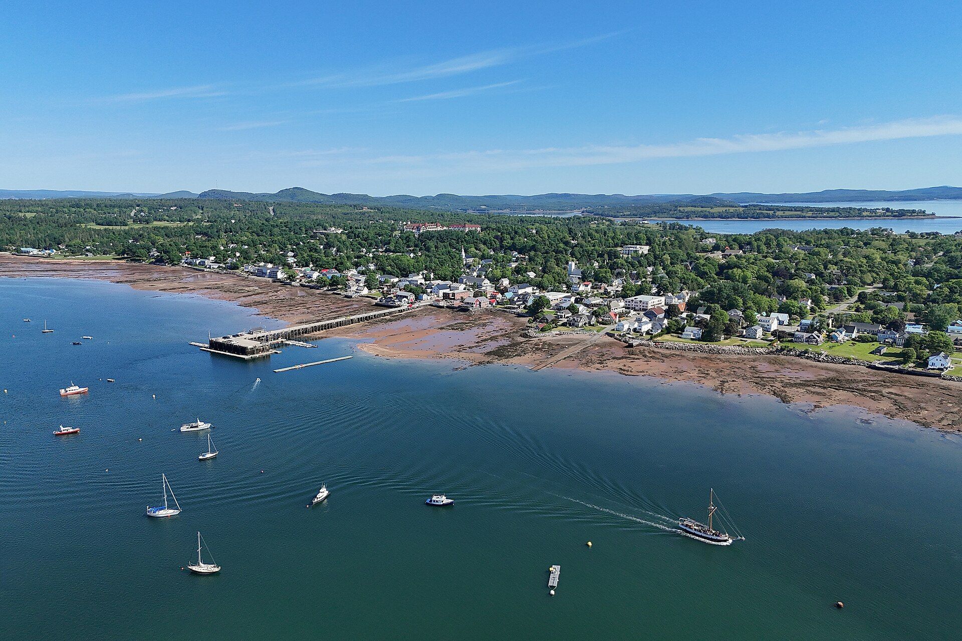 Saint Andrews, New Brunswick, seen from above, with boats moored in the bay.