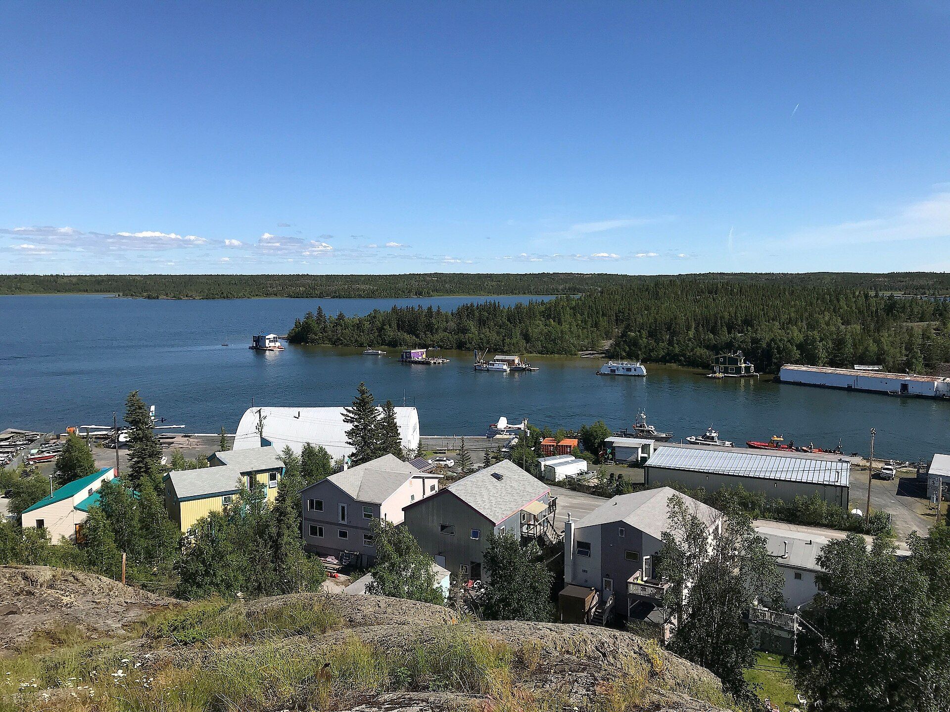 Houses on the rocks above Yellowknife Bay, looking toward Jolliffe Island.