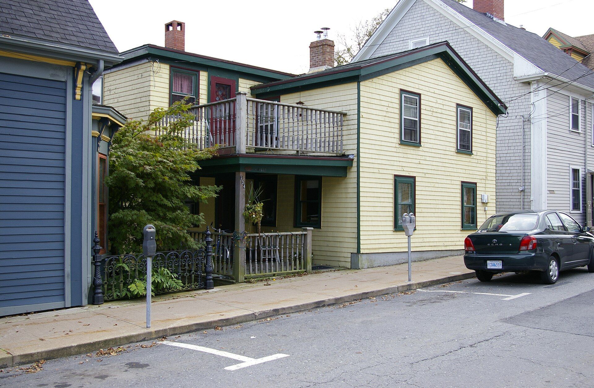 A yellow wooden house on Pelham Street in Lunenburg, Nova Scotia.