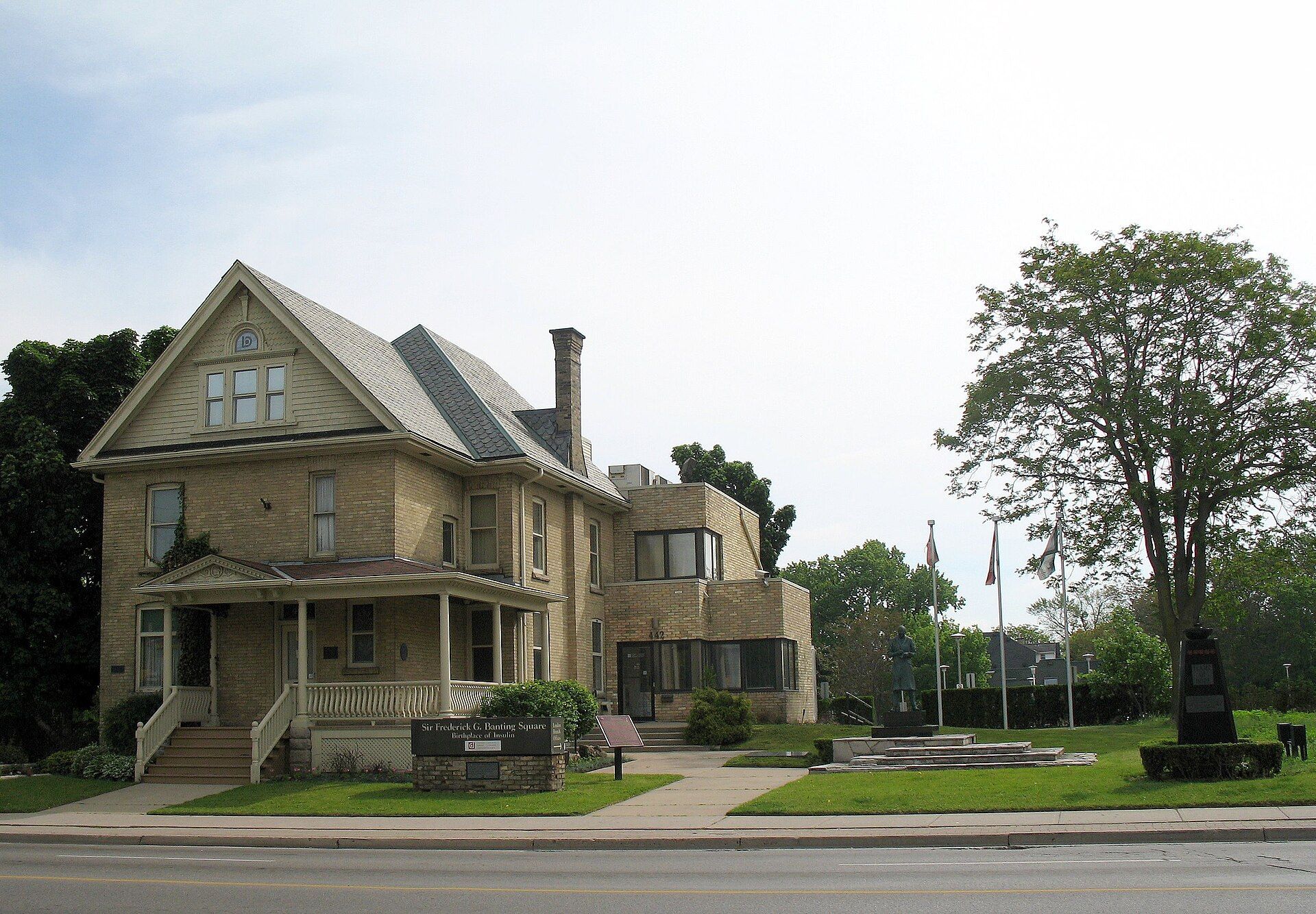 Banting House, a brick house on a corner lot, in London, Ontario.