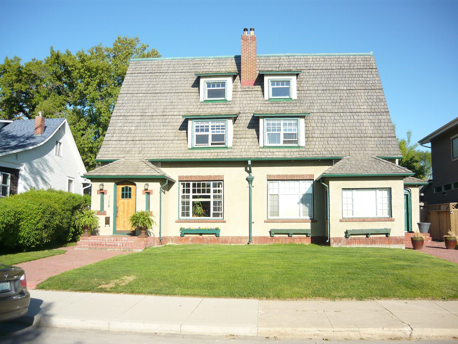 F. P. Martin House, a house with a steep roof and dormers, in Saskatoon, Saskatchewan.