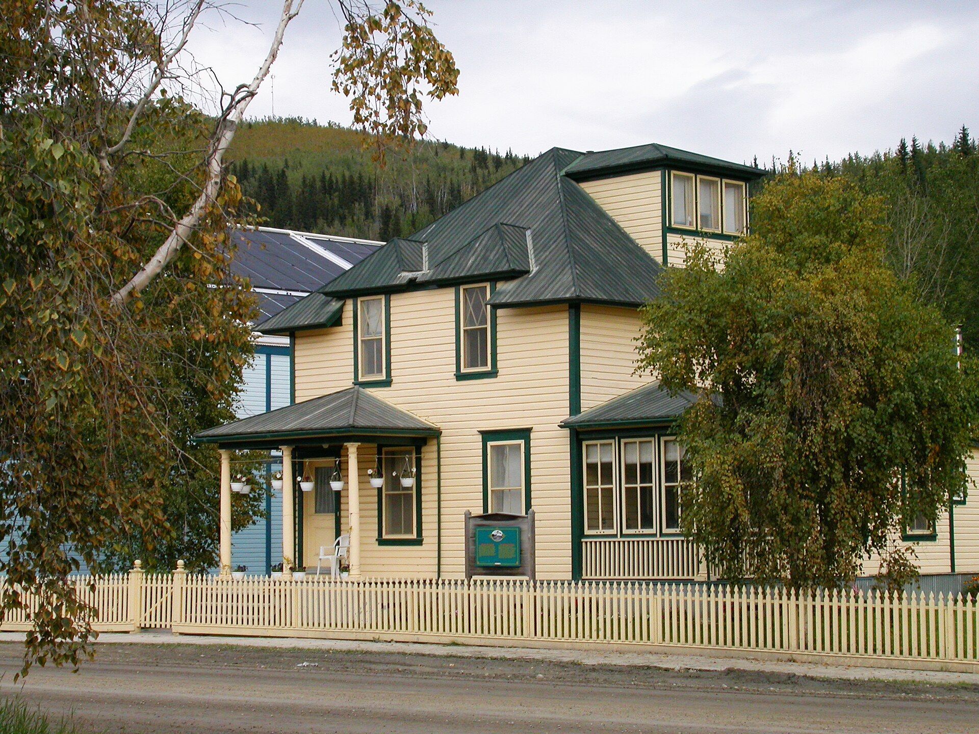 A two-storey wooden house on Fifth Avenue in Dawson City, Yukon.